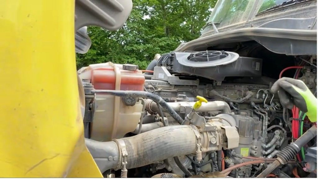 Semi truck driver side engine system