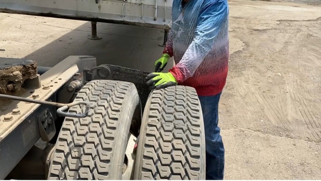 Rear of semi truck wheels